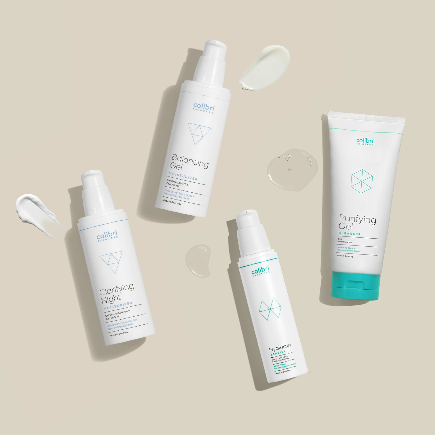 Purifying Gel Cleanser, hyaluron Booster, Balancing Gel Moisturizer und Clarifying  Night Moisturizer Flaschen mit Klecks